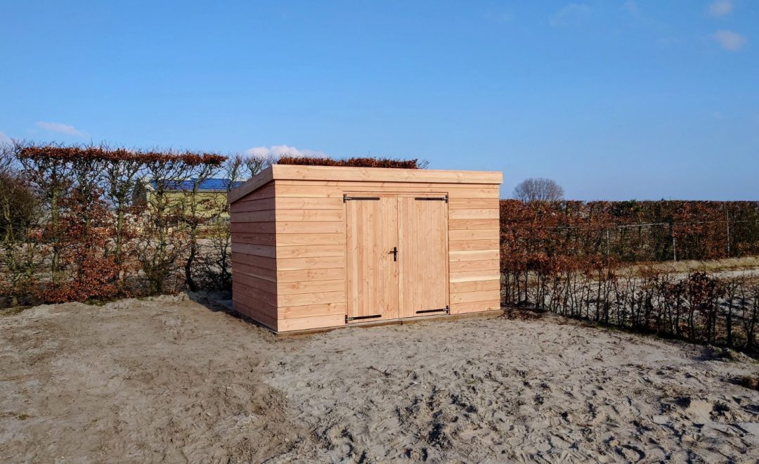 Fietsenschuur met dubbele deur